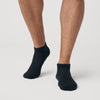Black Ankle Socks Single on feet, showcasing seamless toe and contour seam.