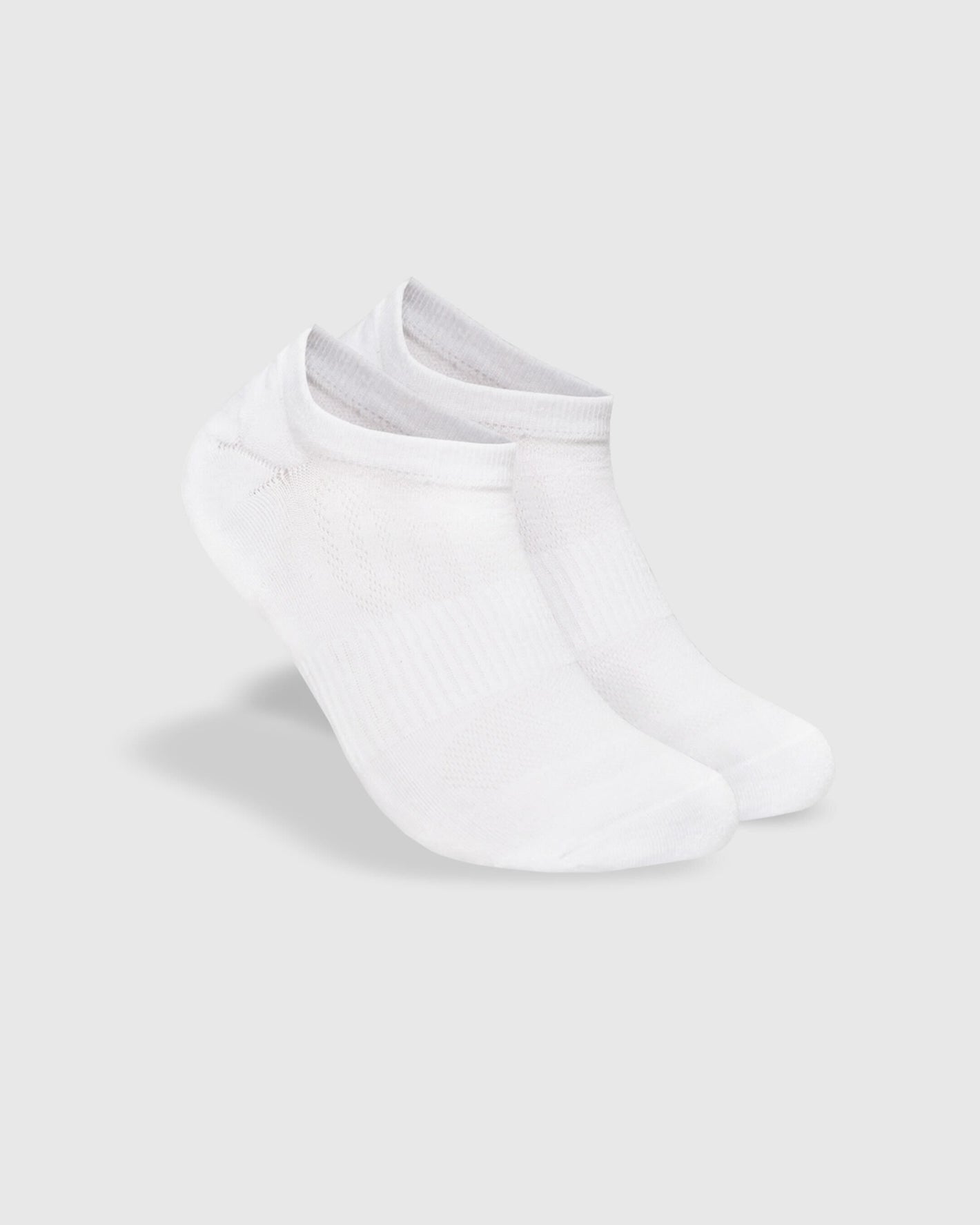 White Ankle Sock Single, featuring seamless toe and contour seam construction.
