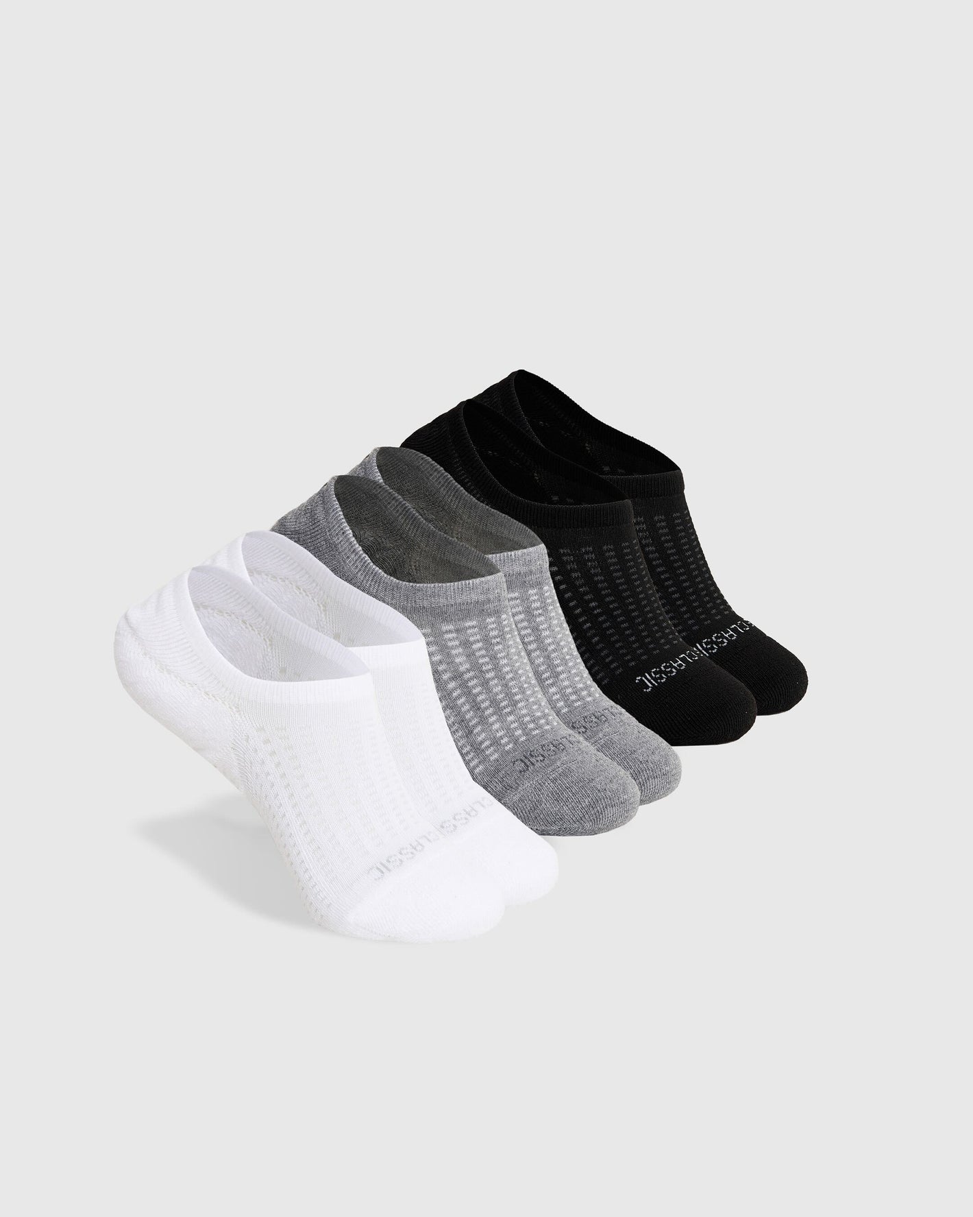 Combo Active No Show Socks 3-Pack with perforated tops in white, gray, black.