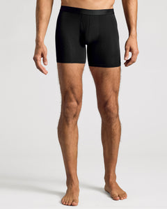 True ClassicBlack Boxer Briefs W/ Fly 6-Pack worn by a standing model.