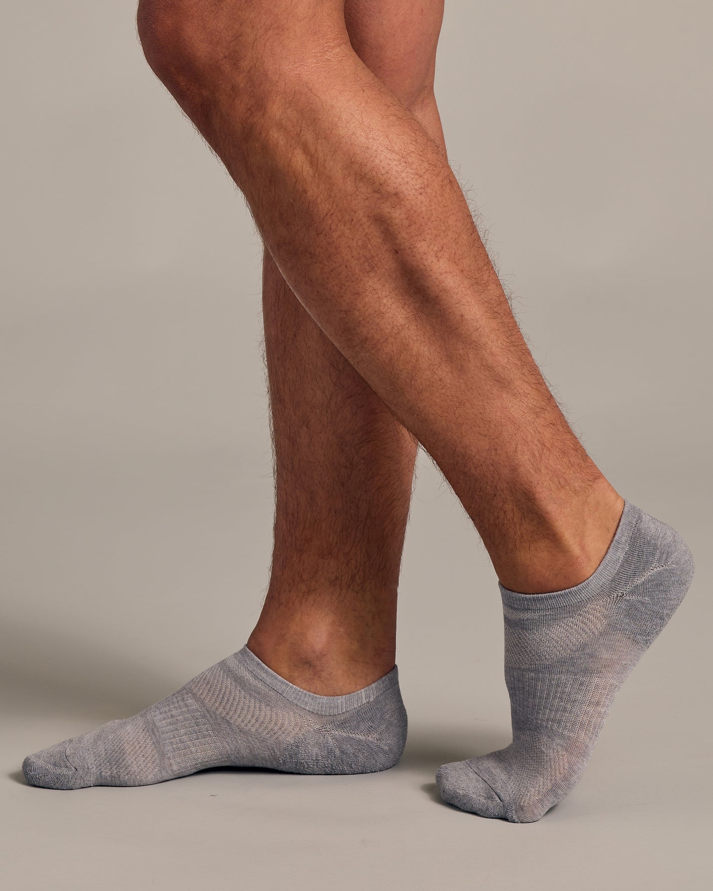 Heather Gray No Show Socks 3 Pack 2.0 on feet, neutral background.