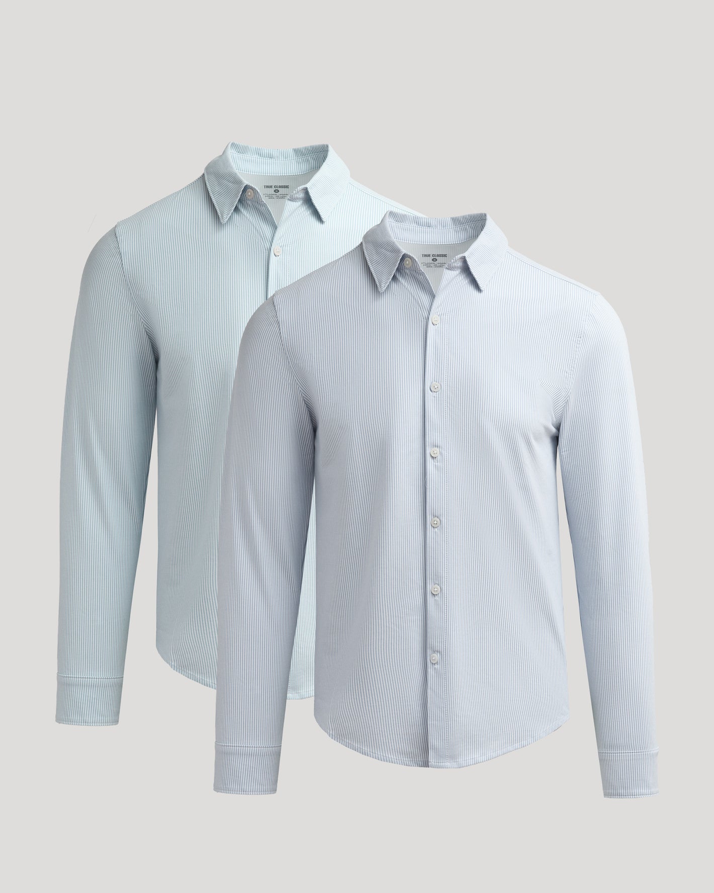 Long Sleeve Stretch Oxford 2-Pack shirts with fine stripes and button details.