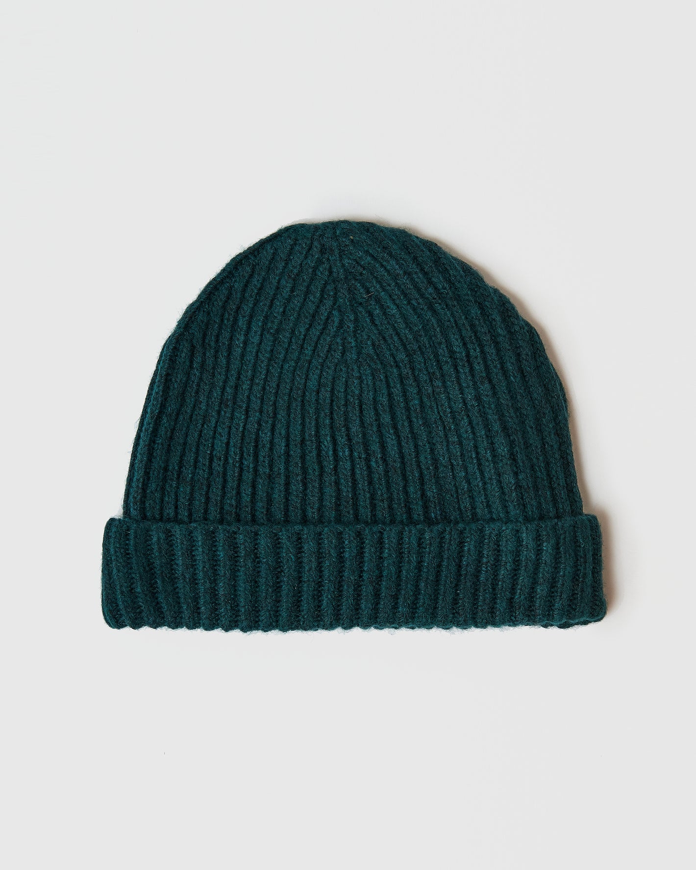 Evergreen Sweater Beanie: dark teal, rib-knit with folded brim.