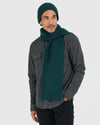 Man wearing Evergreen Sweater Scarf and matching beanie.