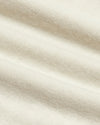 Alabaster Classic Crew Neck in light-beige knit fabric close-up.