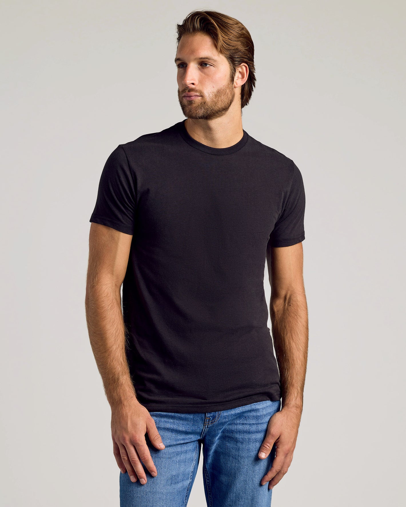 Woodland Shades Crew Neck 6-Pack: Man wears fitted black t-shirt, jeans.