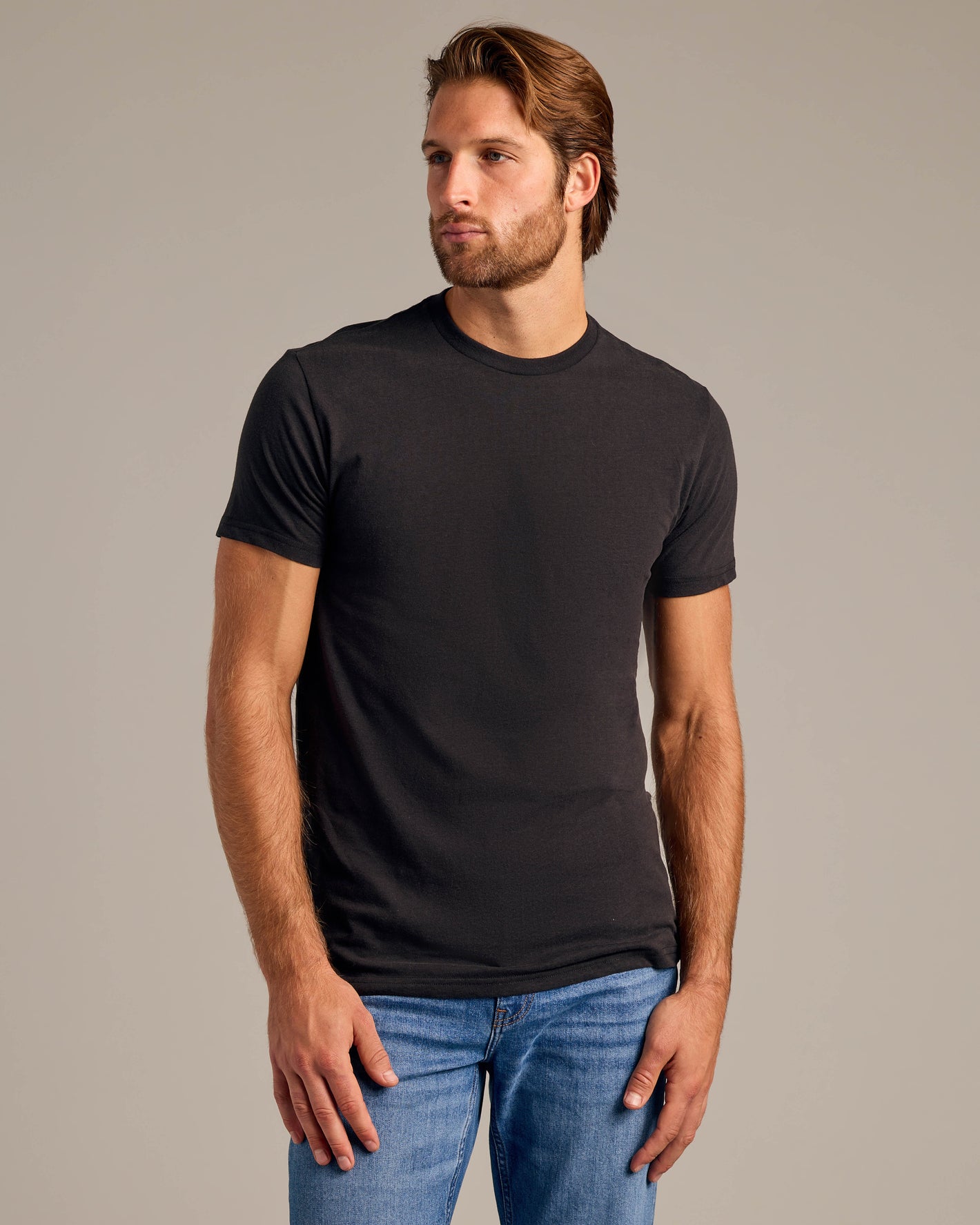 Core Sleeve Variety 5-Pack modeled: black short sleeve tee, blue jeans.