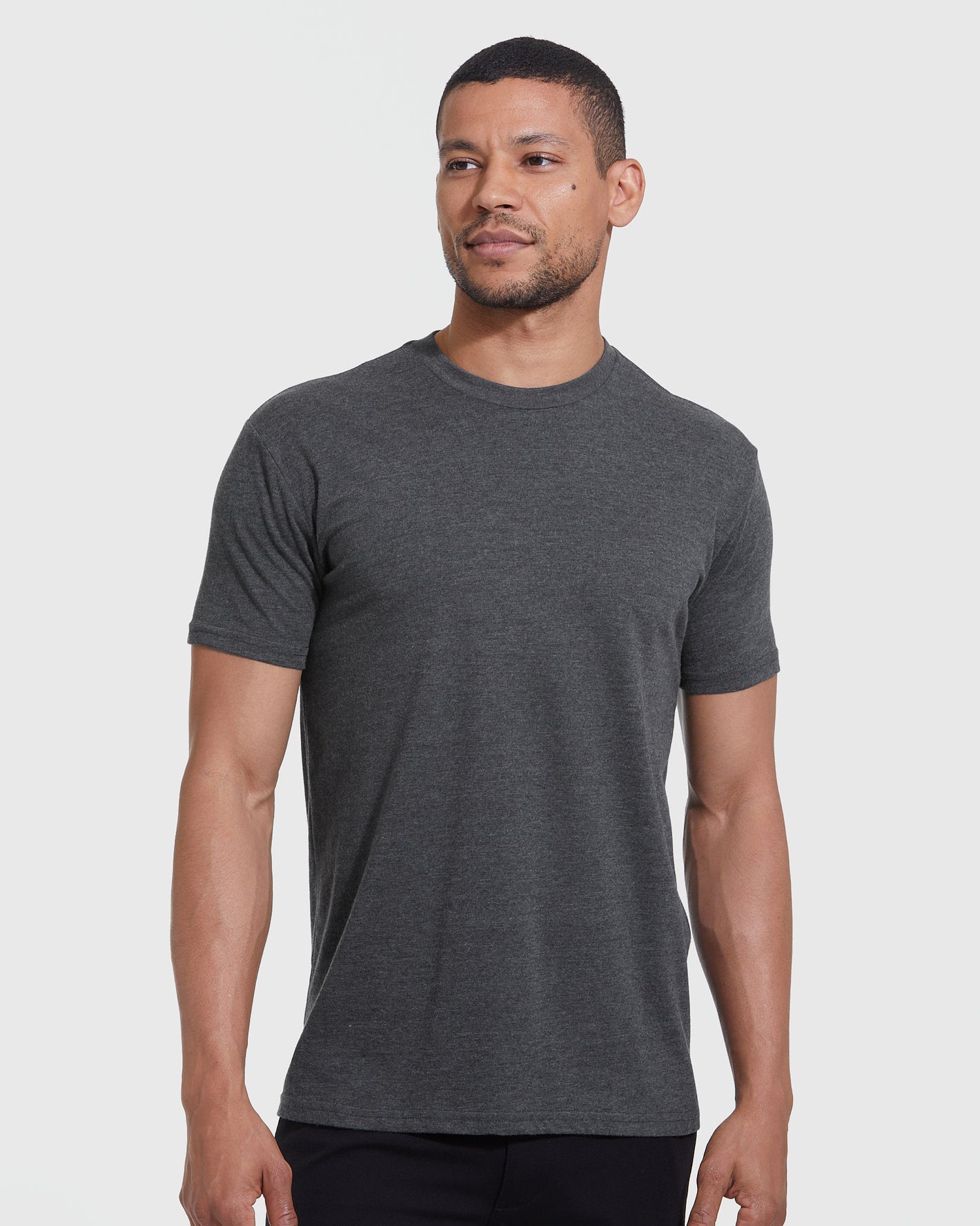 Core Sleeve Variety 5-Pack: Model in charcoal gray short-sleeve tee.