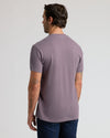 Man in Dark Heather Amethyst Classic Crew Neck, showing tattoos.