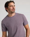 Man wearing Dark Heather Amethyst Classic Crew Neck T-shirt.