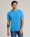 Young man in Dark Heather Bahama Blue Classic Crew Neck T-shirt.