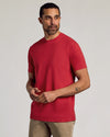 Man wearing Dark Heather Lava Short Sleeve Crew Neck Tee with beige pants.