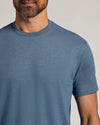 Dark Heather Tempest Classic Crew Neck on man, showing upper torso and jawline.