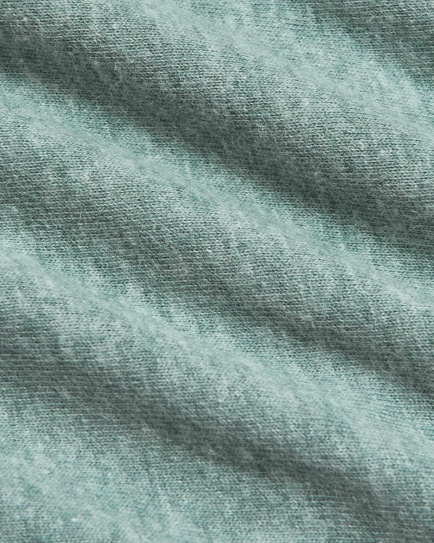 Macro shot of Heather Balsam Classic Crew Neck's woven fabric.