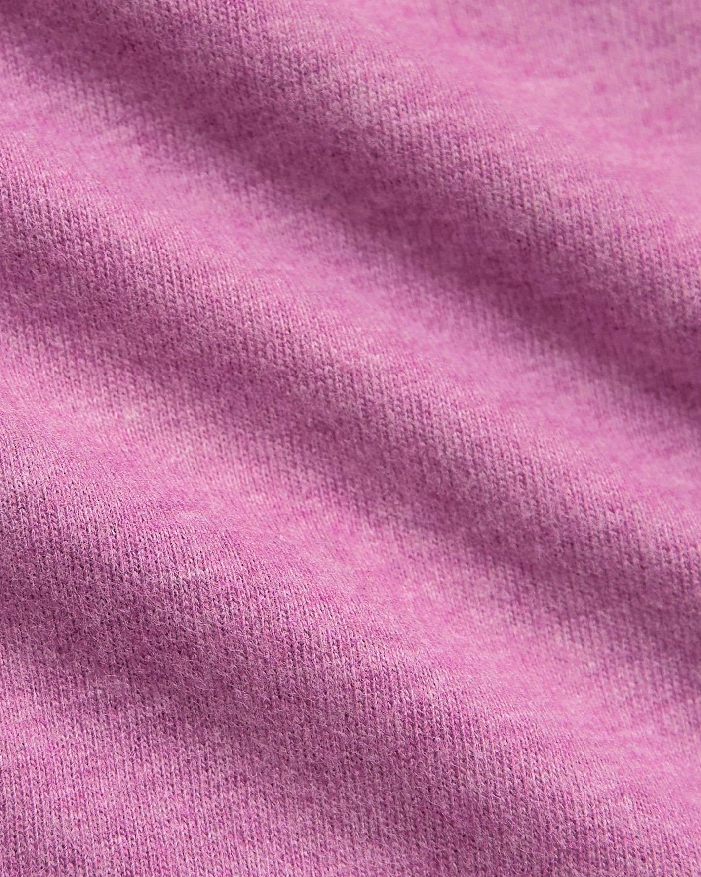 Heather Magenta Classic Crew Neck's fine knit texture close-up.