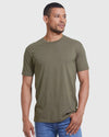 Man in olive-green Classic Crew 3-Pack T-shirt and blue jeans.