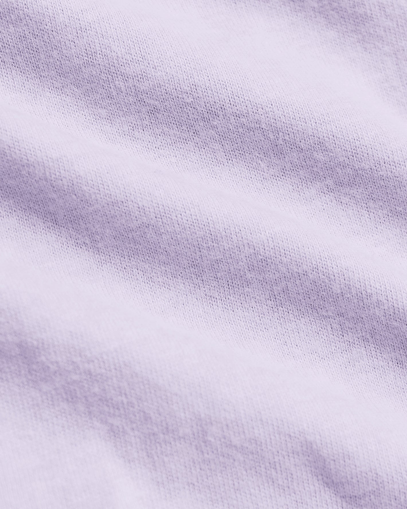 Heather Orchid Classic Polo, close-up of lilac knit fabric texture.