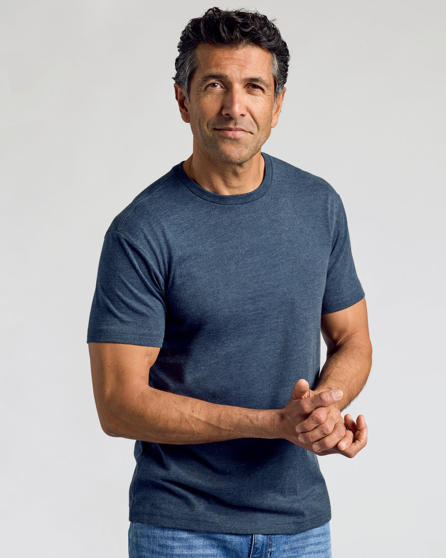 Middle-aged man in Classic Crew 10-Pack, wearing heather-navy T-shirt.