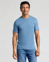 Man in sky-blue Classic Crew 3-Pack T-shirt and jeans.