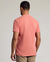 Man wearing Light Heather Vermilion Classic Crew Neck, short-sleeve T-shirt.