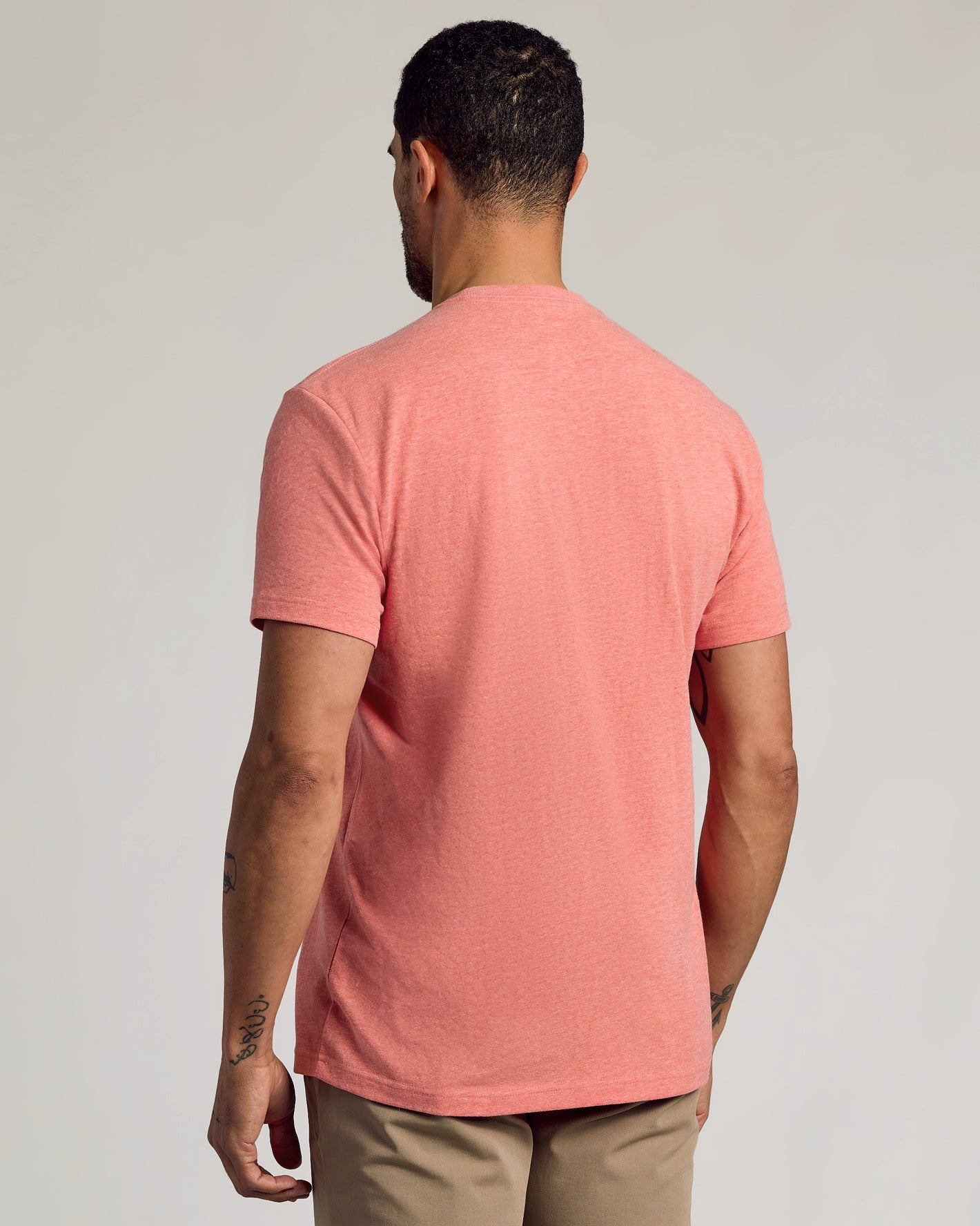 Man wearing Light Heather Vermilion Classic Crew Neck, short-sleeve T-shirt.