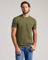 Young man in olive-green tee from The Versatile Crew 9-Pack.