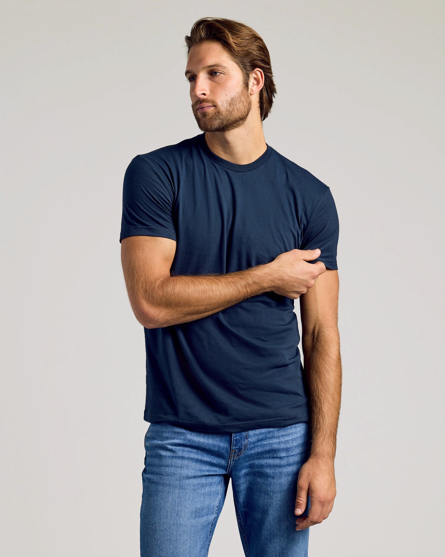 Young man in Navy Tee from The Versatile Crew 9-Pack.