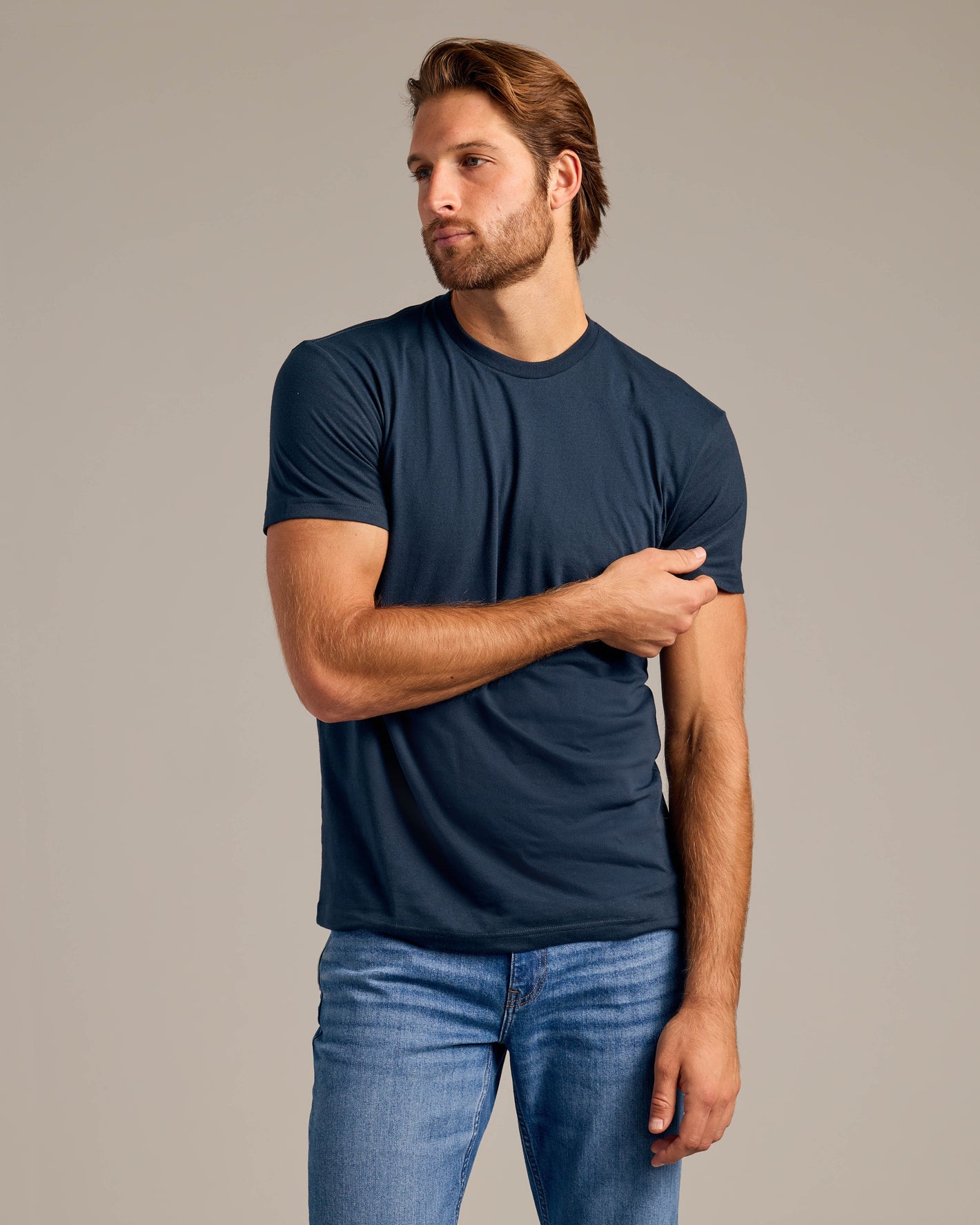 Core Sleeve Variety 6-Pack: young man in navy tee and jeans.