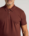 Man wearing Dark Chocolate Short Sleeve Polo, showcasing its premium fit.