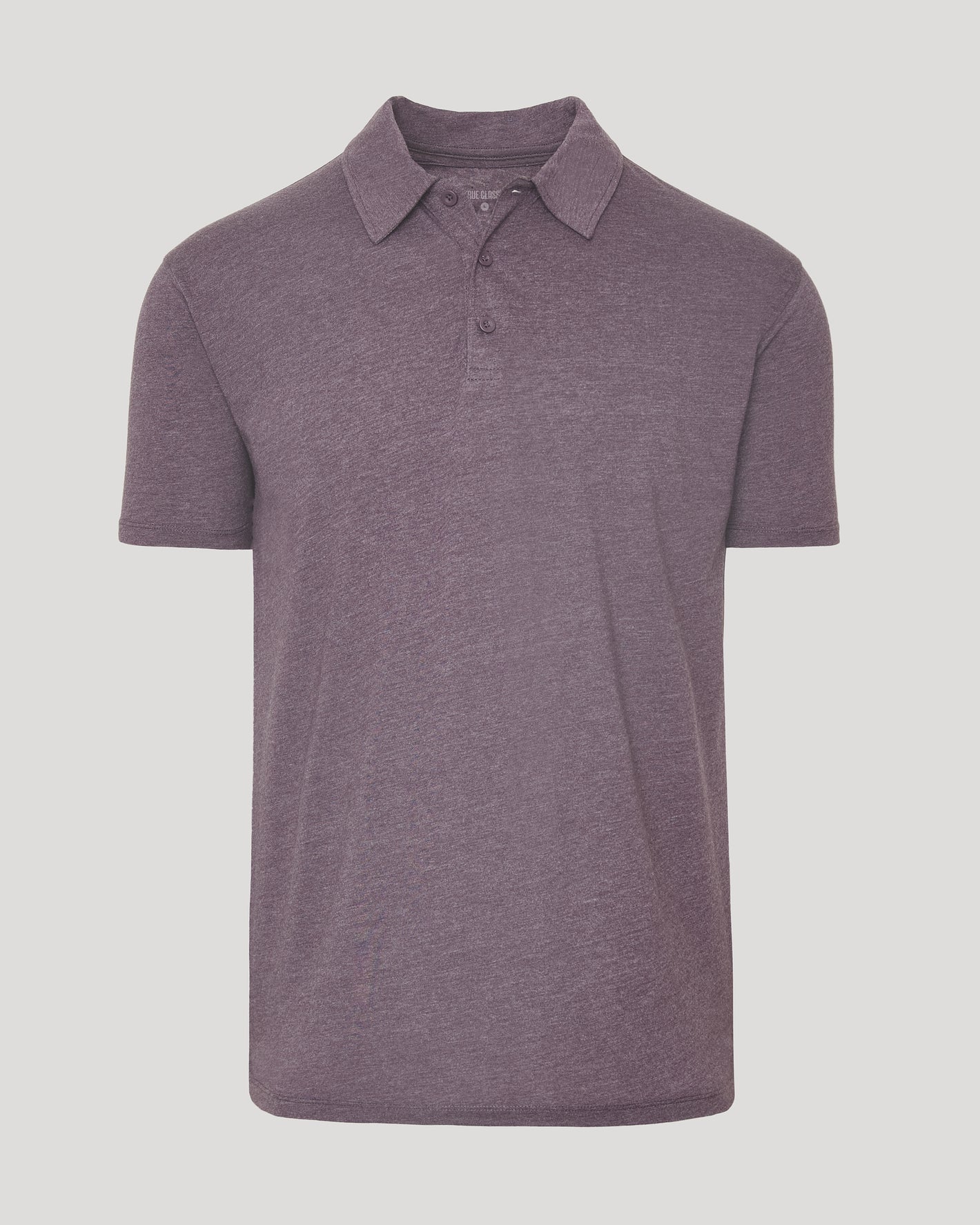 Dark Heather Amethyst Short Sleeve Polo with classic collar and three-button placket.