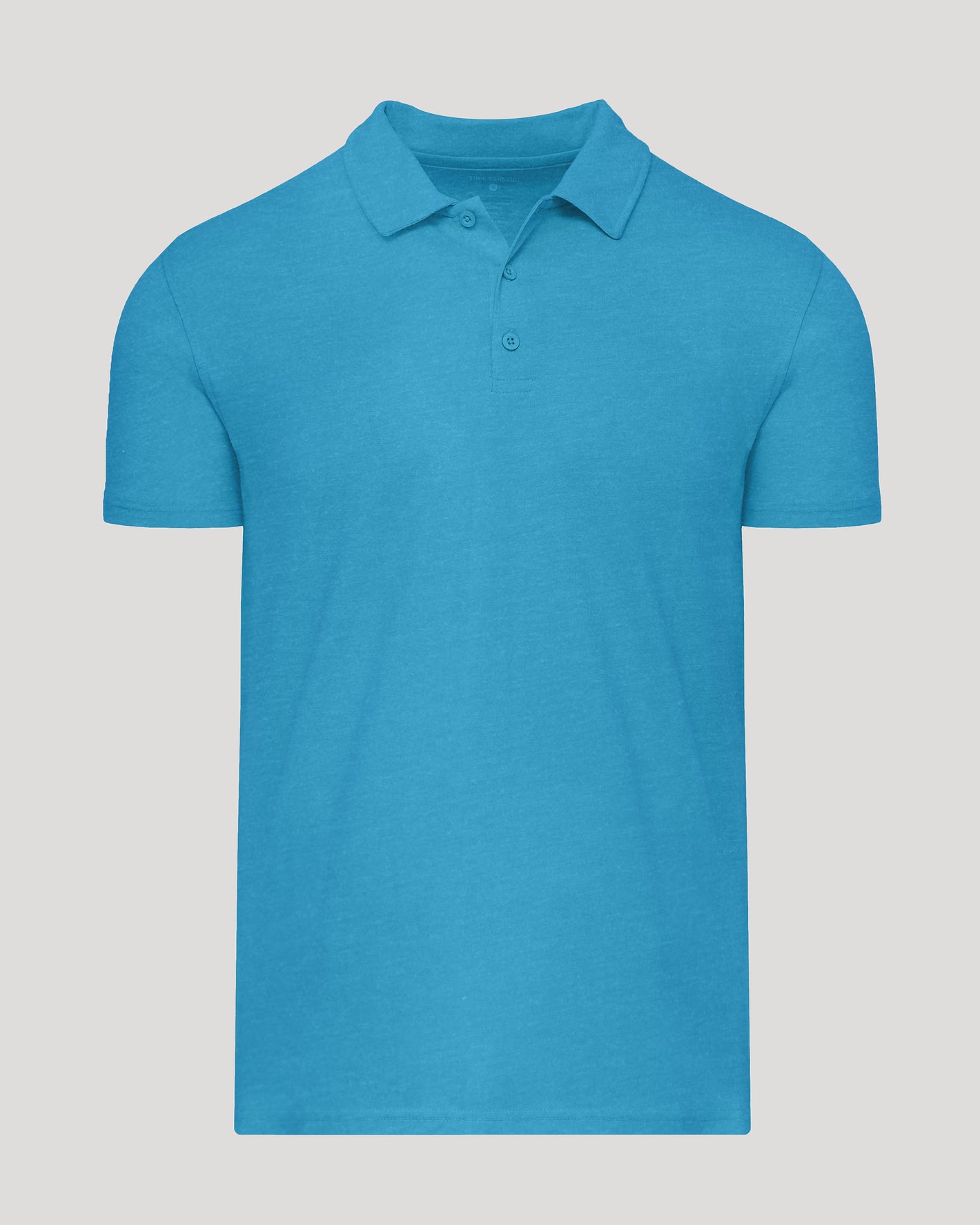 Dark Heather Bahama Blue Short Sleeve Polo with fold-over collar and placket.