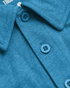 Dark Heather Bahama Blue Short Sleeve Polo with collar and button placket.