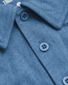 Close-up of Dark Heather Blue Lake Classic Polo, highlighting knit texture, collar, and buttons.