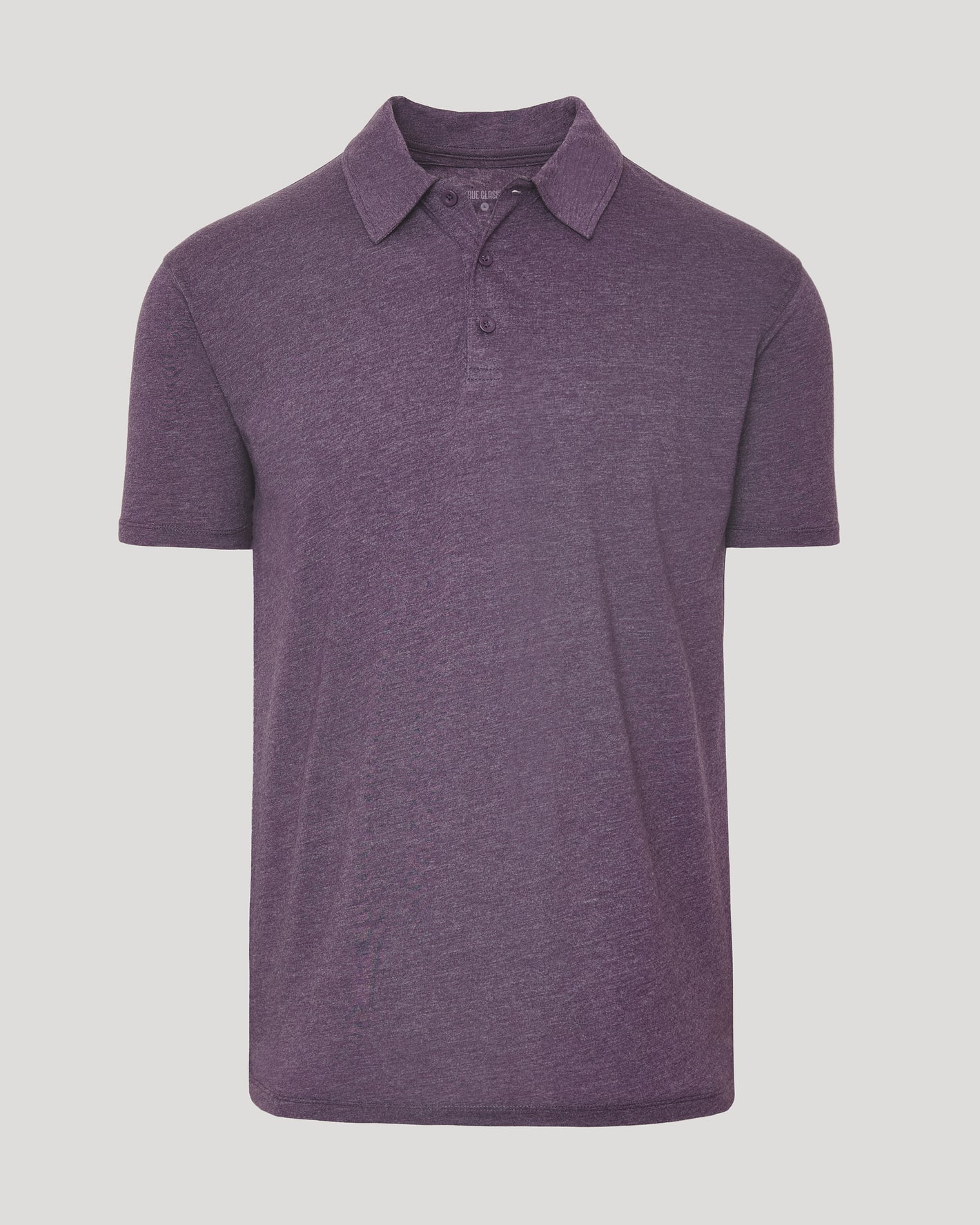 Dark Heather Plum Classic Polo with fold-over collar and three-button placket.