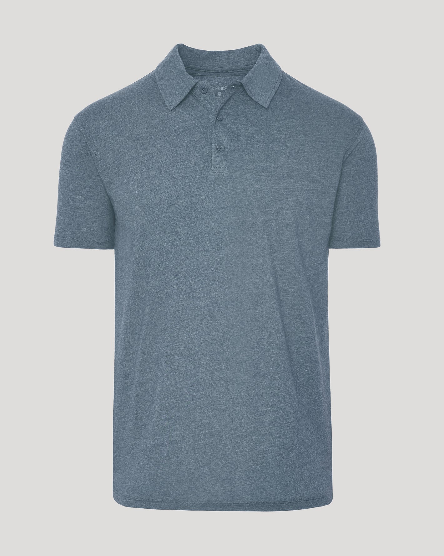 Dark Heather Tempest Short Sleeve Polo with classic collar and three-button placket.
