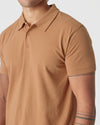 Golden Mane Classic Polo worn, showcasing a fitted, short-sleeve design.