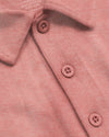 Heather Cayenne Classic Polo, salmon-pink, soft knit texture, folded collar.
