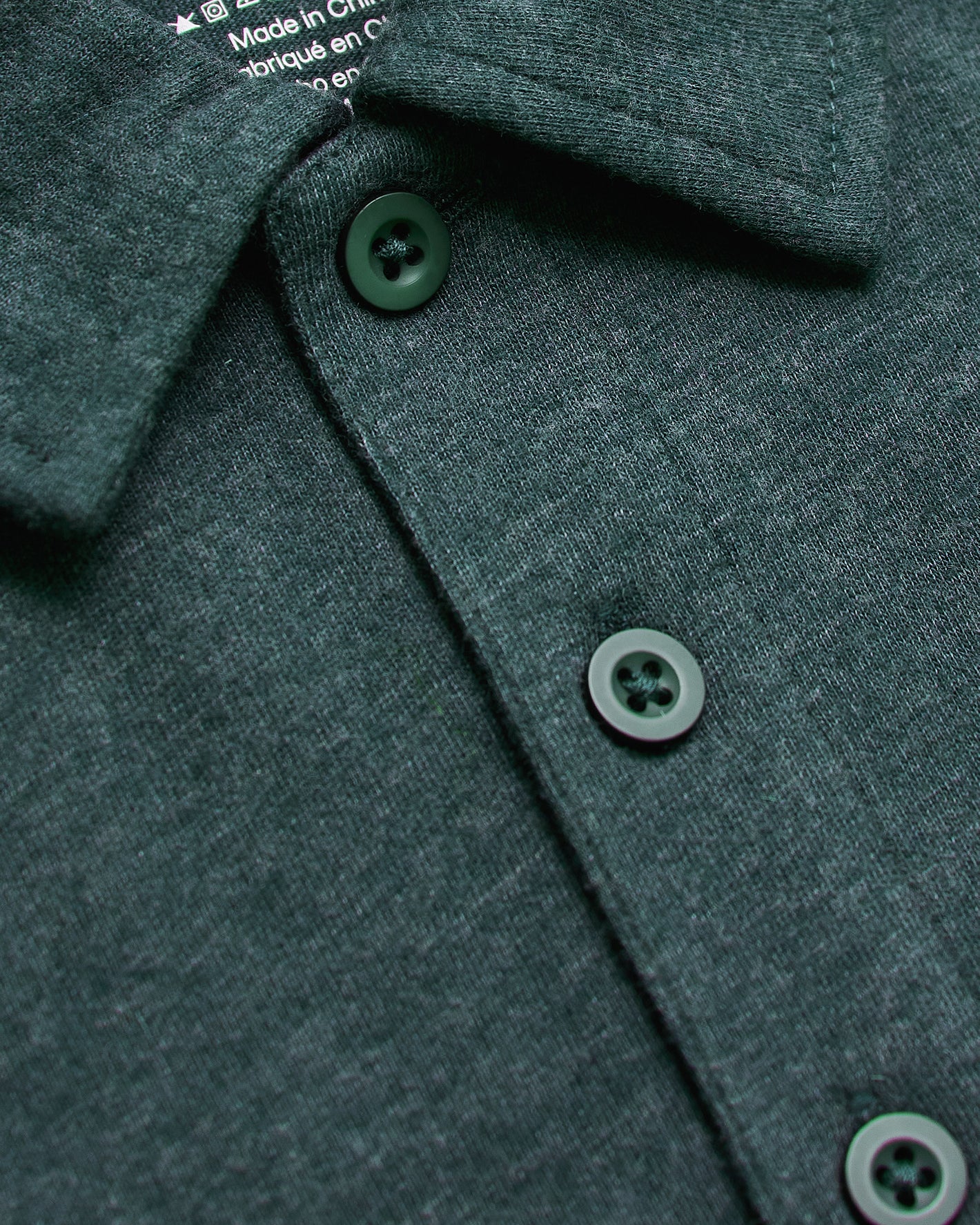 Heather Seafarer Classic Polo detailing collar, texture, and buttons.