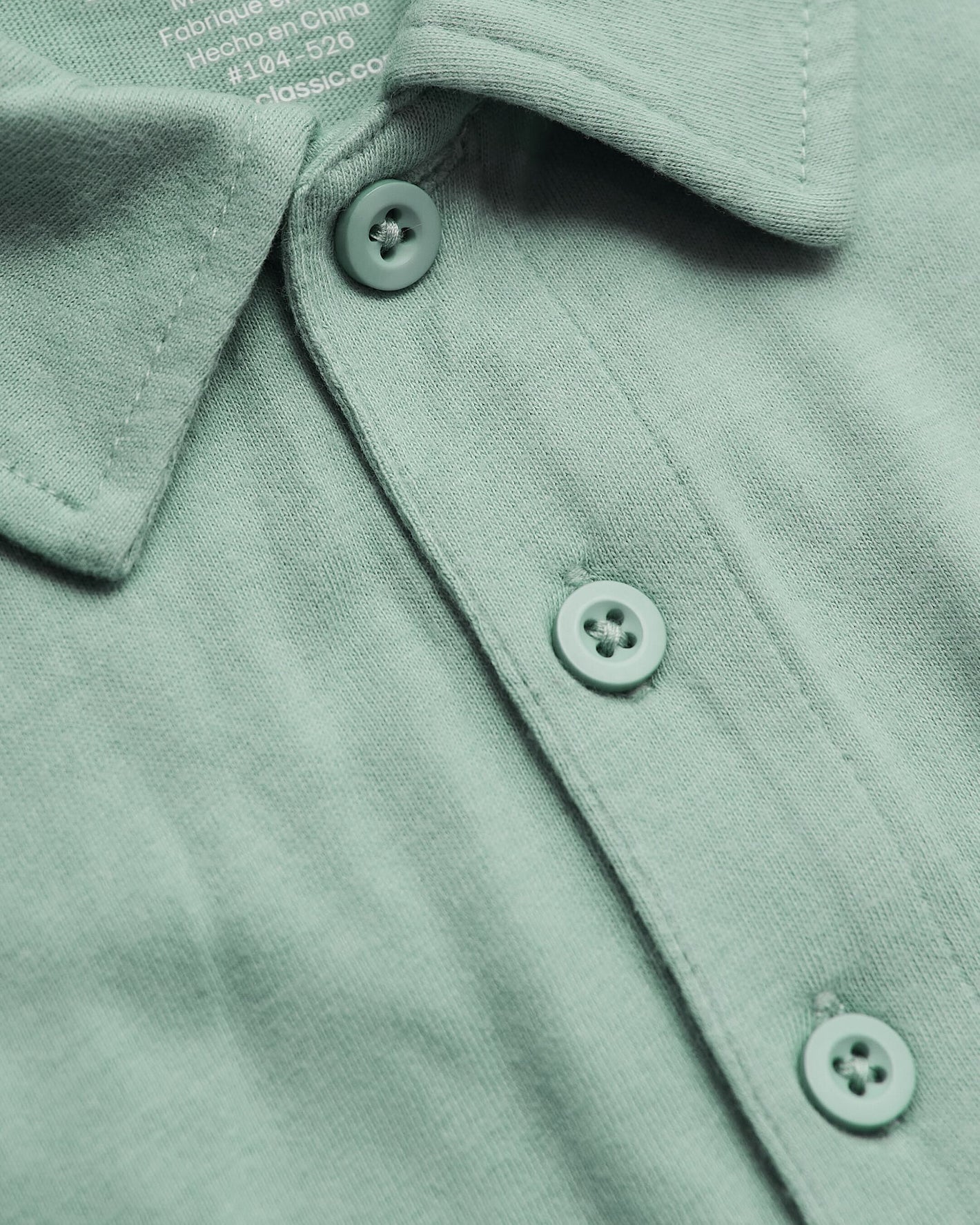 Heather Slate Green Classic Polo close-up, showing collar and buttons.