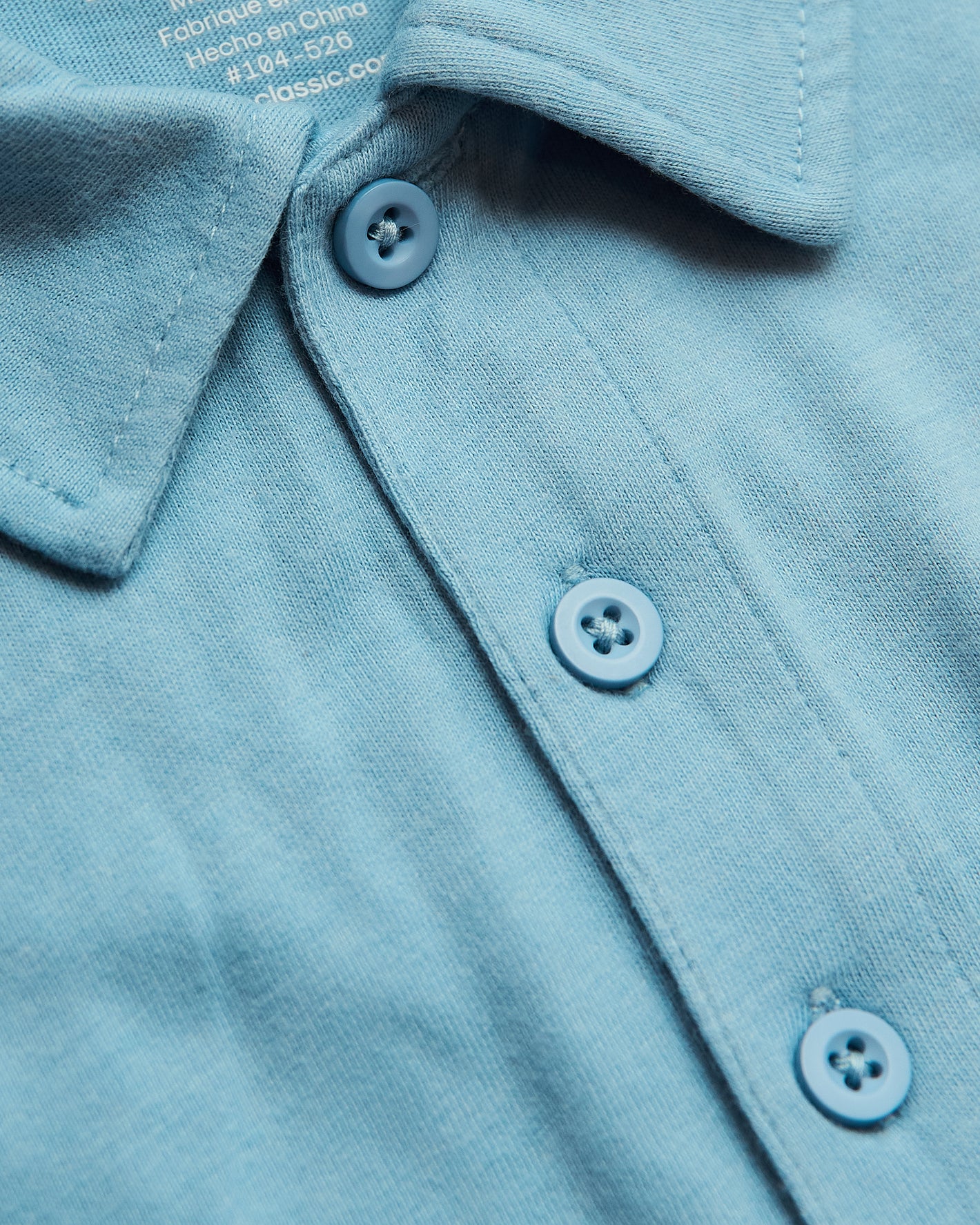 Heather Voyager Short Sleeve Polo close-up showing collar and button placket.
