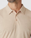 Light Camel Cream Heather Polo with collar and three-button placket.