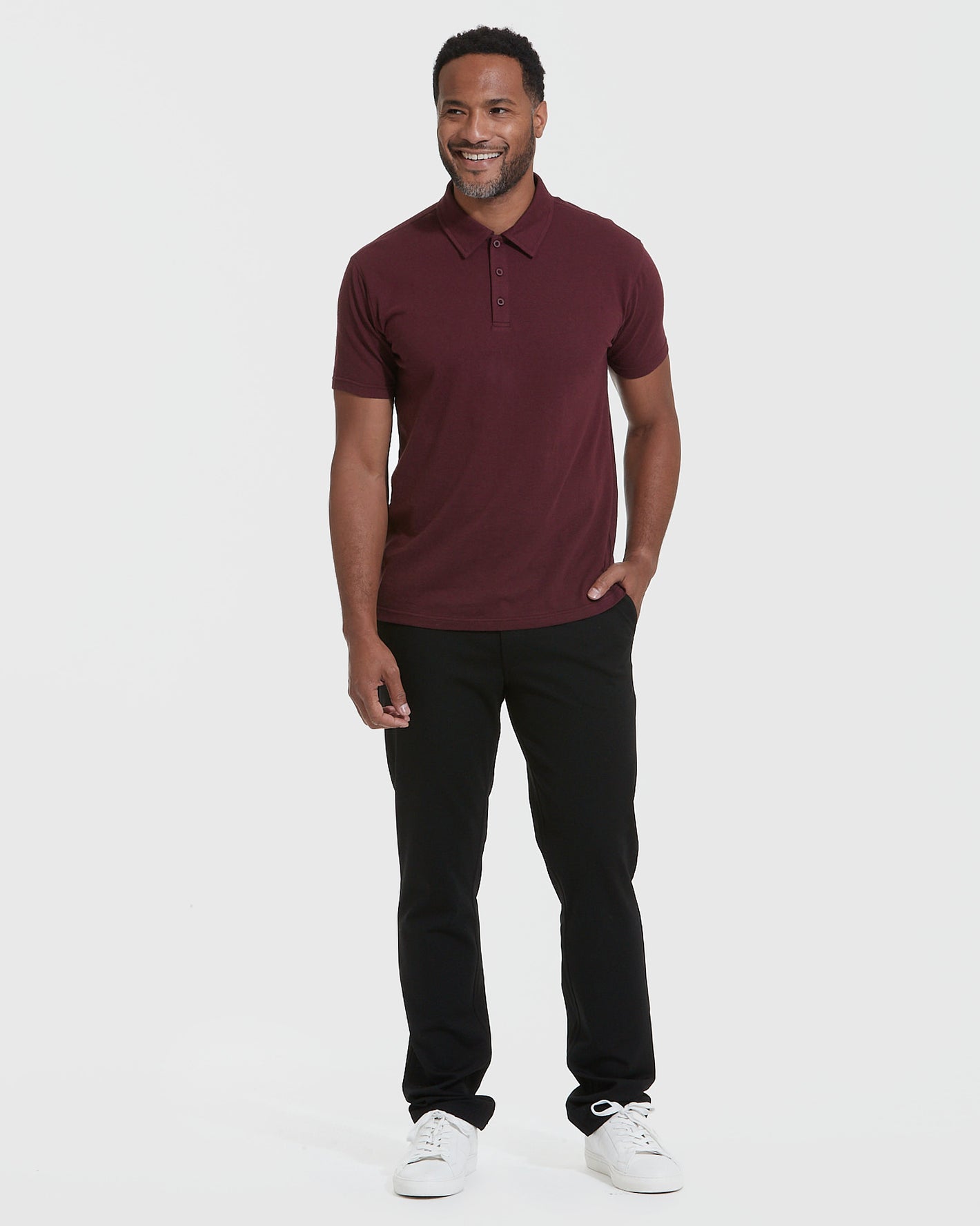 Mahogany Polo worn by man with black pants, white sneakers.