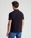 Rear view of man in the All Black Classic Polo.