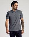 Model in Classic Polo 10-Pack, showcasing slate-gray short-sleeve polo.