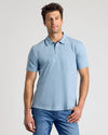 Young man wearing Classic Polo 6-Pack in light blue.
