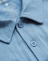 Sky Blue Heather Polo showcasing collar and button placket details.