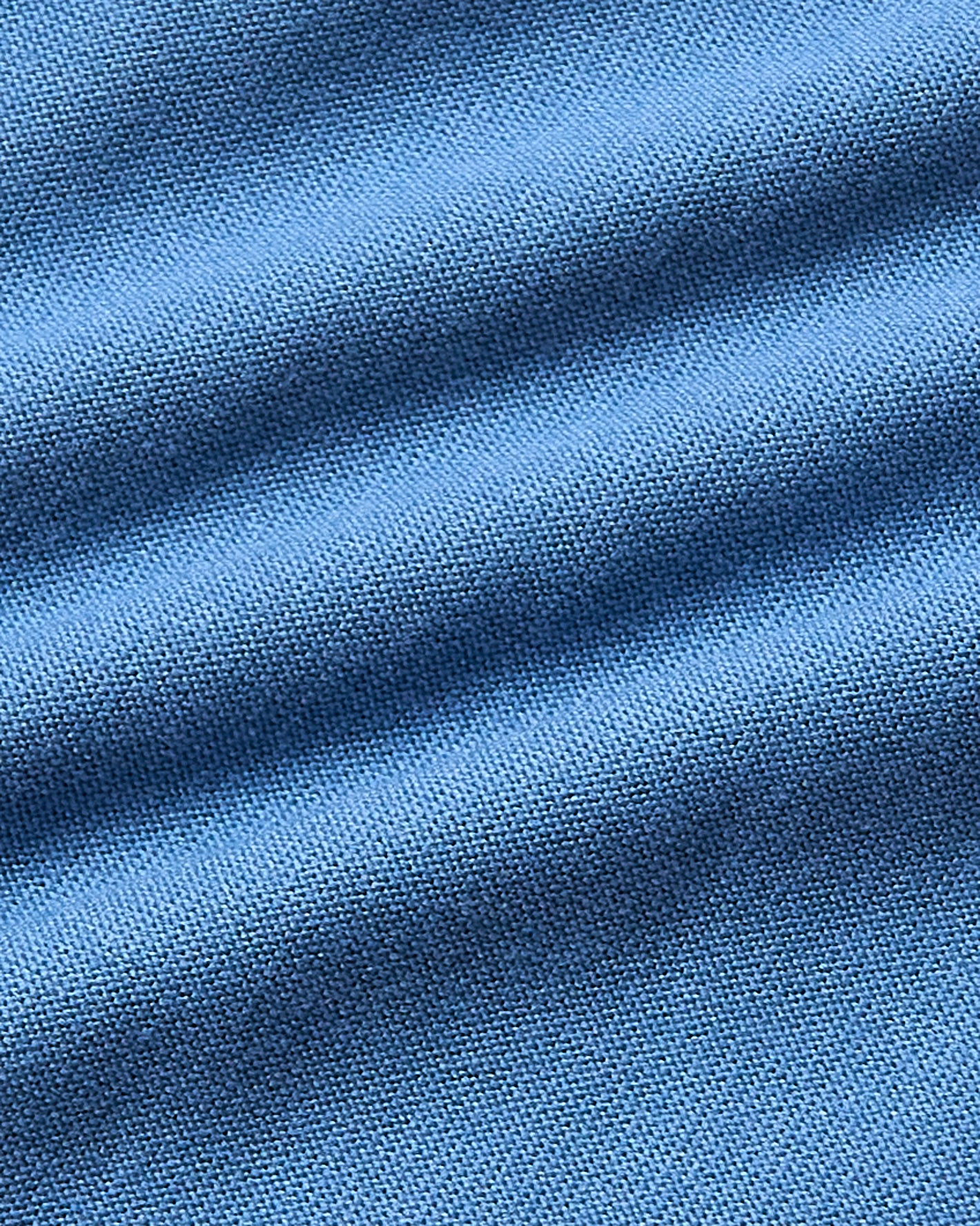 Azul Active Crew Neck Tee's blue woven fabric close-up.