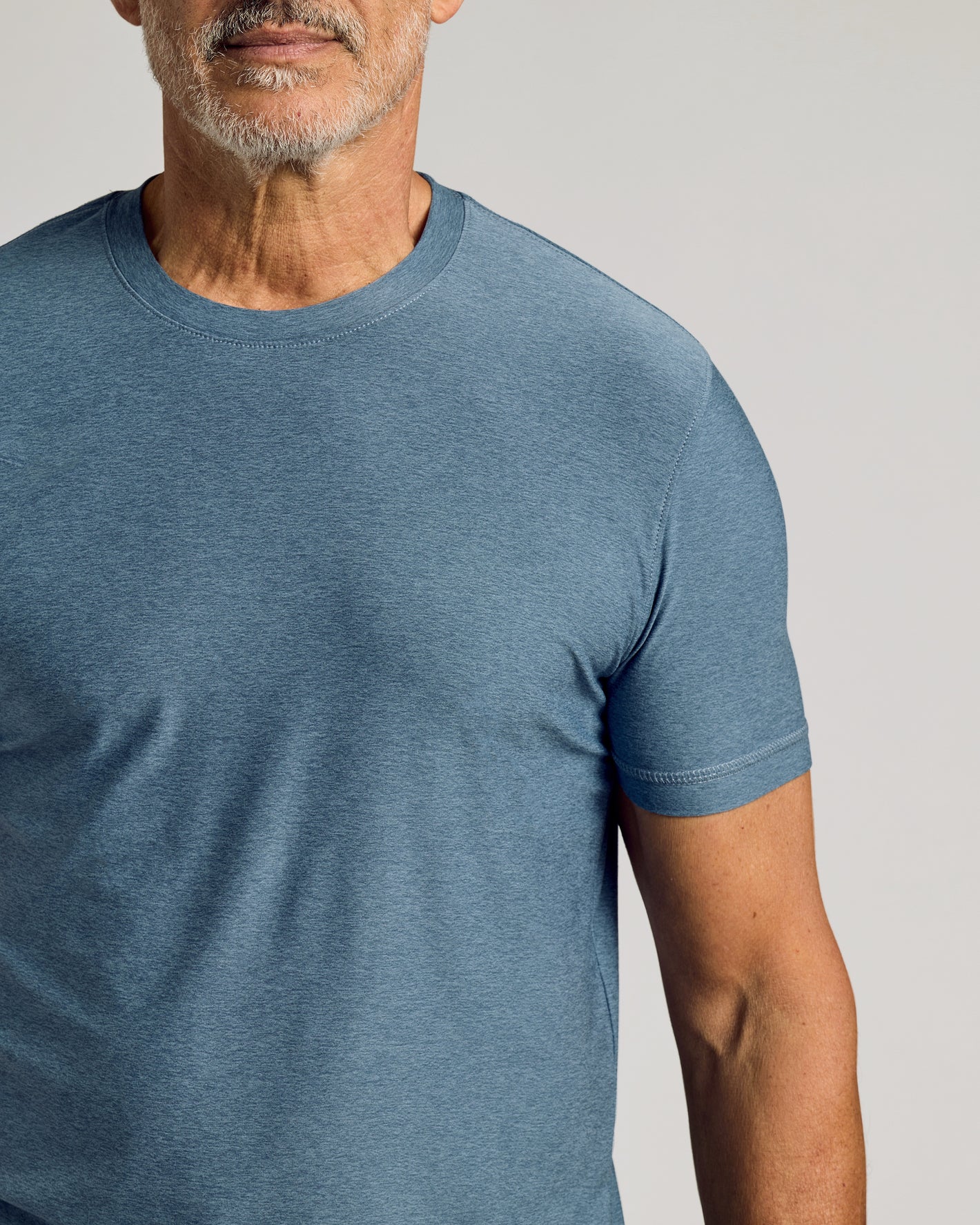 Baltic Active Crew Neck Tee on man, showcasing athletic fit.