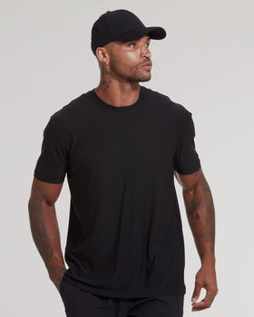 Man wearing a black T-shirt from The Versatile Crew 9-Pack.