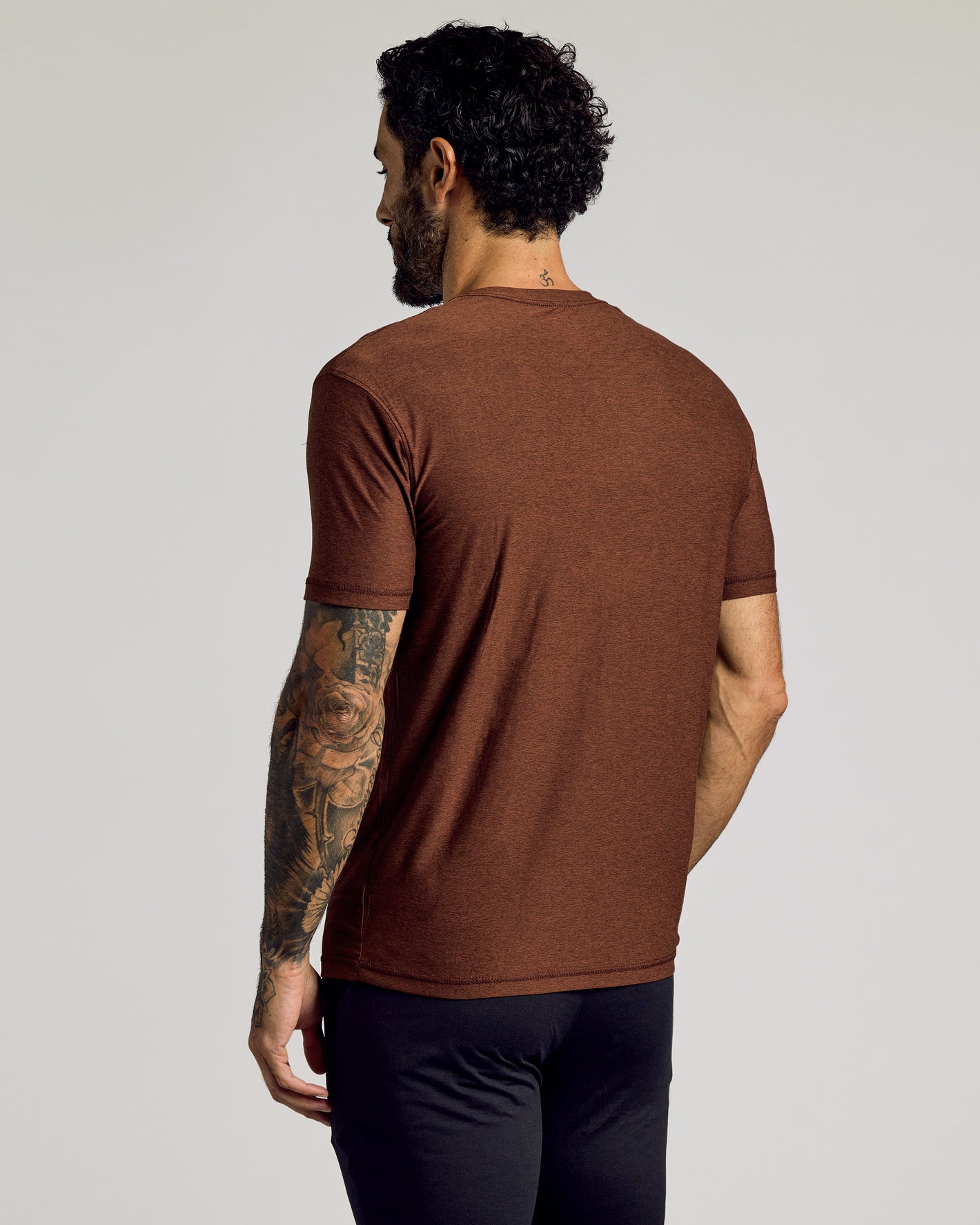 Cedar Active Short Sleeve Crew Neck Tee on tattooed man, back view.